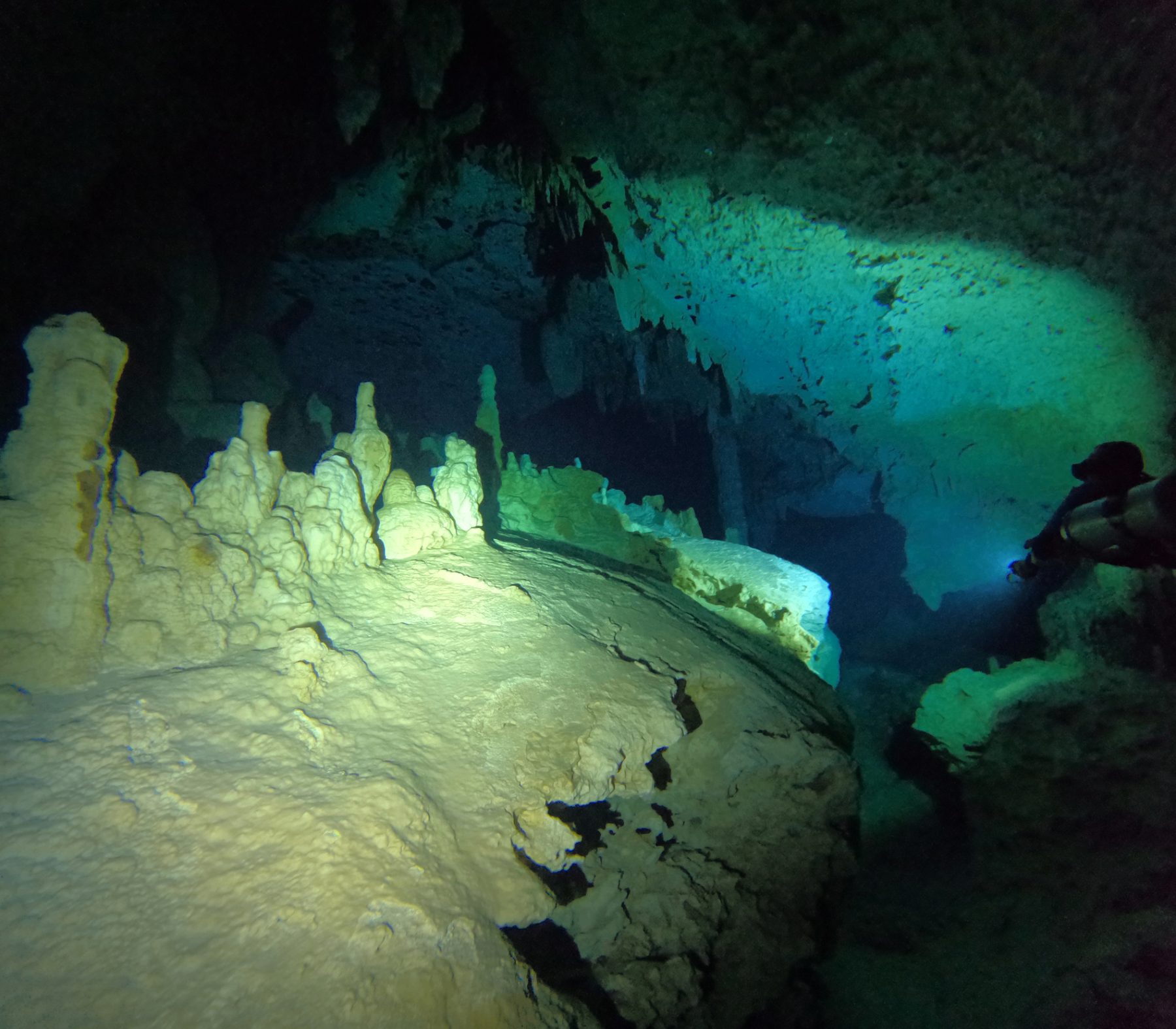 Diver in a cenote cavern